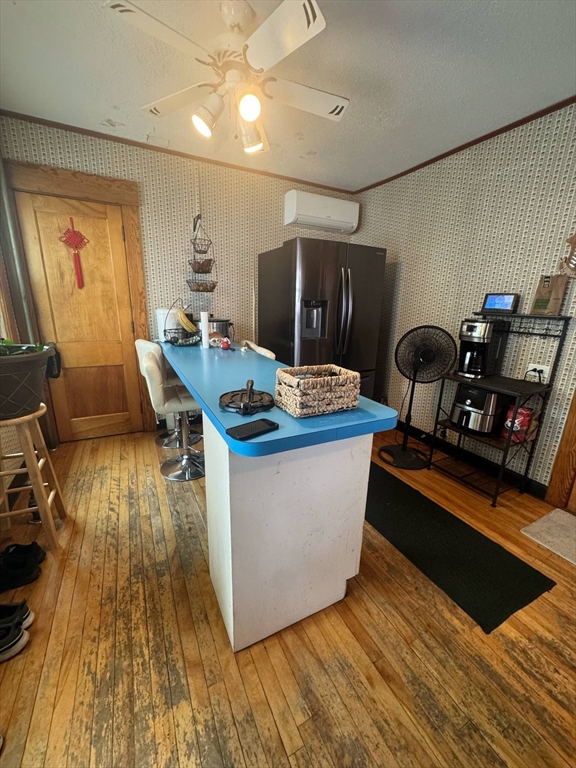 104 Maple Street Gardner, MA 01440 - Photo 13 of 15 a living room with furniture and a wooden floor
