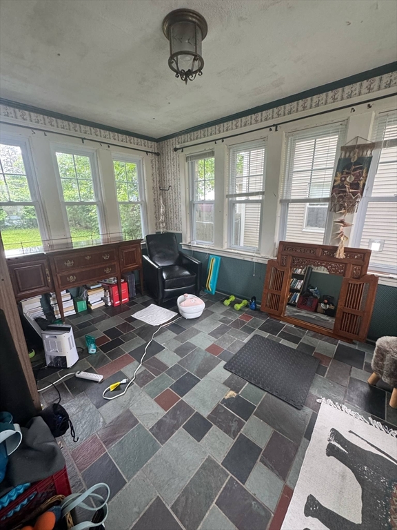 104 Maple Street Gardner, MA 01440 - Photo 4 of 15 a living room with furniture and a window
