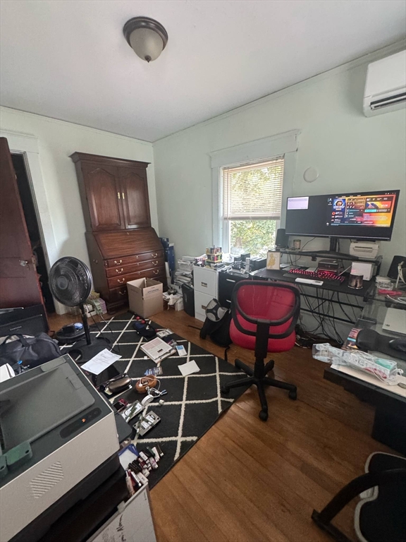 104 Maple Street Gardner, MA 01440 - Photo 9 of 15 a living room with lots of furniture and a wooden floor