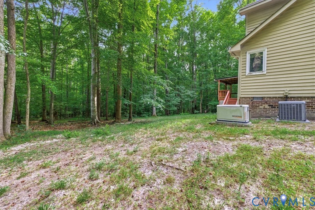 4099 Doe Run Road Hopewell, VA 23860 - Photo 33 of 36 Expansive wooded property featuring mature trees