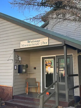 a view of a wooden door of the house