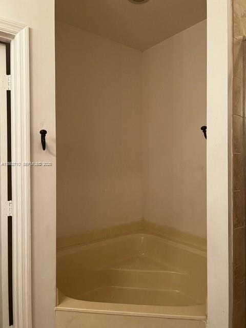 608 Northeast 33rd Terrace, Unit 608 Homestead, FL 33033 - Photo 12 of 35 a bathroom with a shower