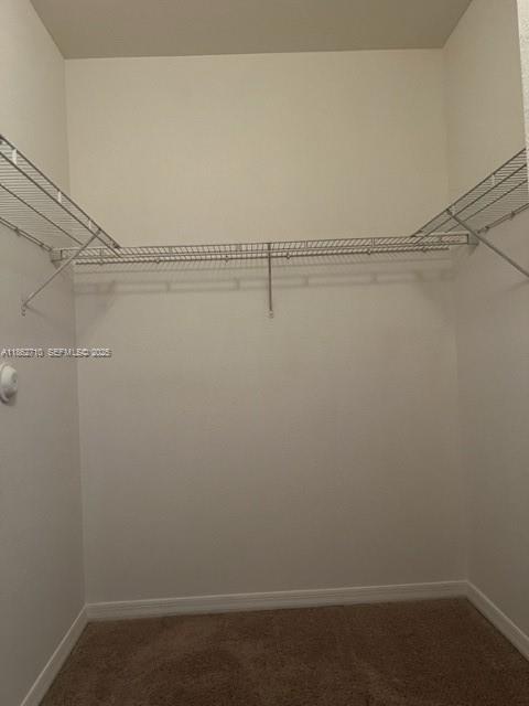 608 Northeast 33rd Terrace, Unit 608 Homestead, FL 33033 - Photo 14 of 35 a view of small space with racks on the wall