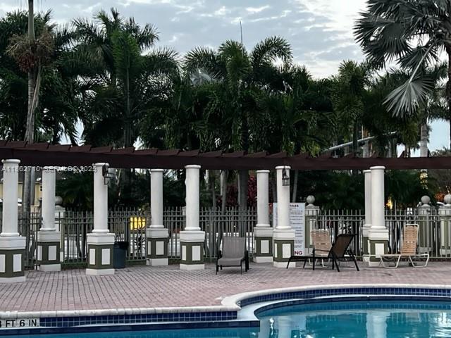 608 Northeast 33rd Terrace, Unit 608 Homestead, FL 33033 - Photo 28 of 35 a view of outdoor space yard deck patio and outdoor kitchen