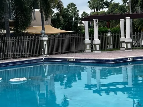 a view of swimming pool with deck