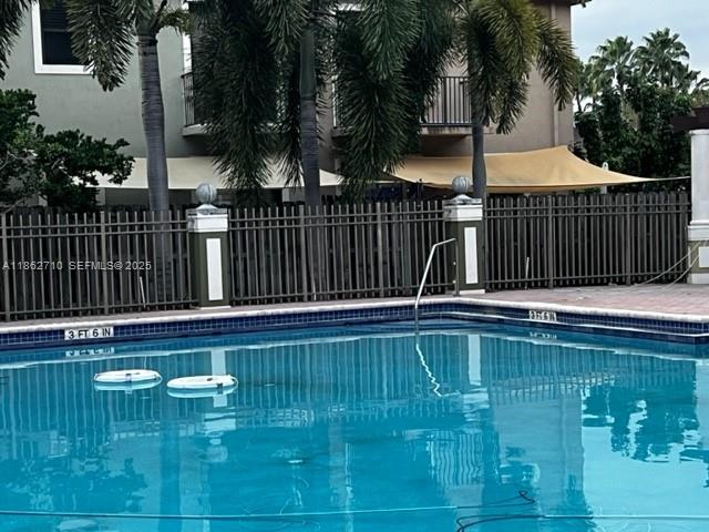 608 Northeast 33rd Terrace, Unit 608 Homestead, FL 33033 - Photo 31 of 35 a view of swimming pool with deck