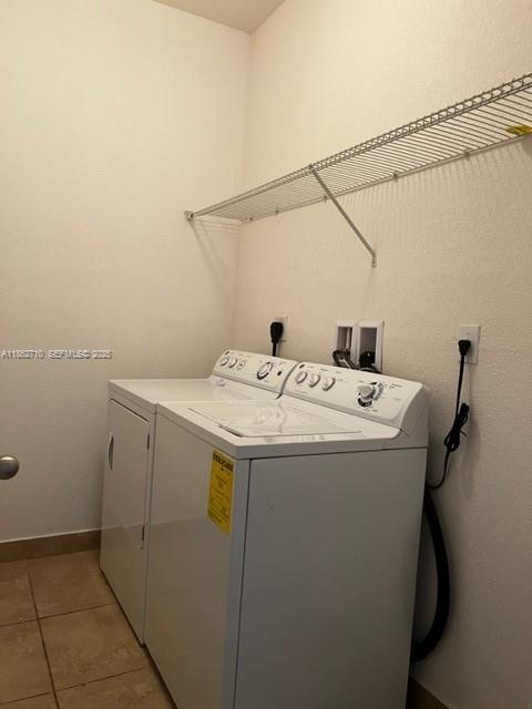 608 Northeast 33rd Terrace, Unit 608 Homestead, FL 33033 - Photo 10 of 35 a utility room with dryer and washer