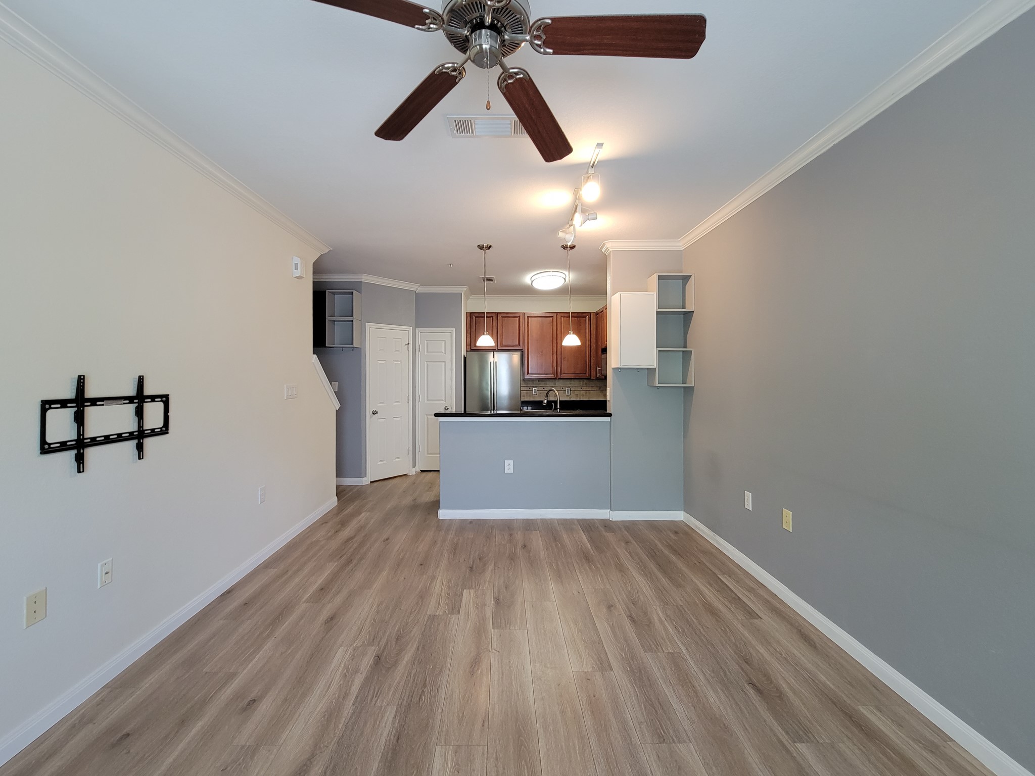 9200 Westheimer Road, Unit 305 Houston, TX 77063 - Photo 12 of 32 wooden floor in an empty room with a window