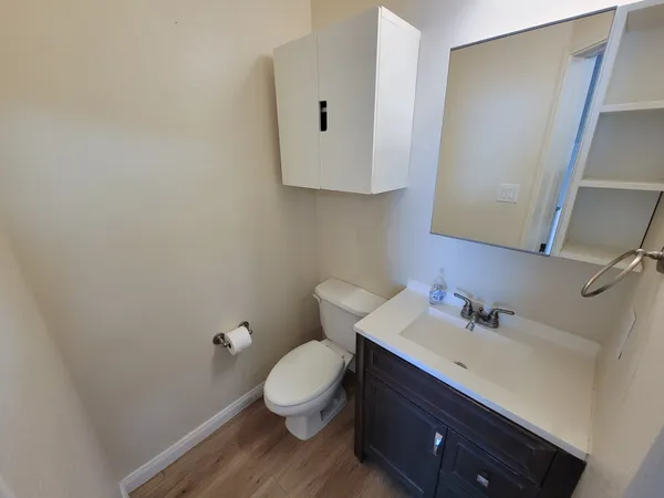 a kitchen with stainless steel appliances granite countertop a refrigerator stove a sink and dishwasher