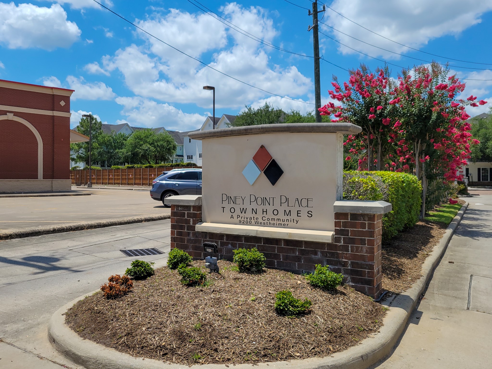 9200 Westheimer Road, Unit 305 Houston, TX 77063 - Photo 31 of 32 a sign that is sitting on a sidewalk
