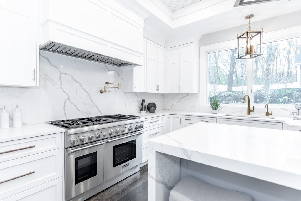 35 Wayne Road Newton, MA 02459 - Photo 14 of 33 a kitchen with a stove a sink and a microwave