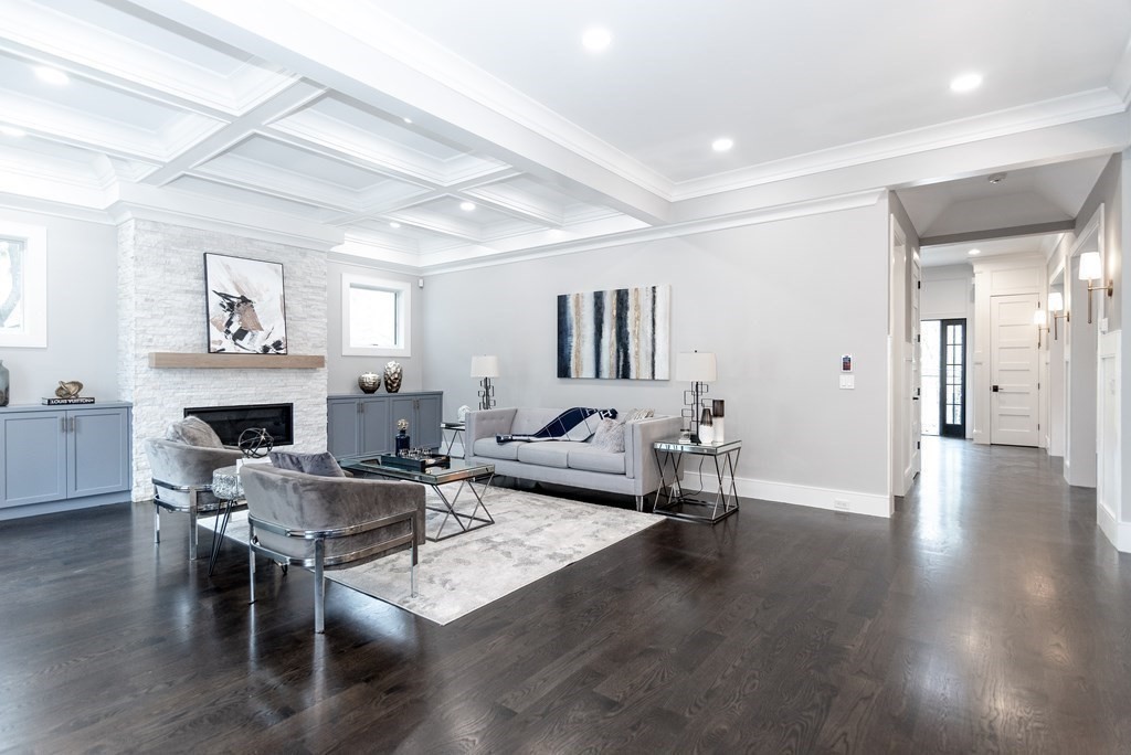 35 Wayne Road Newton, MA 02459 - Photo 17 of 33 a living room with fireplace furniture and a wooden floor