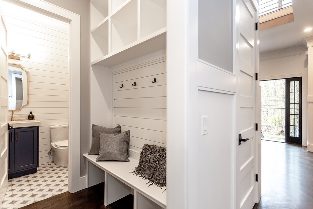 35 Wayne Road Newton, MA 02459 - Photo 19 of 33 a bathroom with a granite countertop sink a toilet and shower