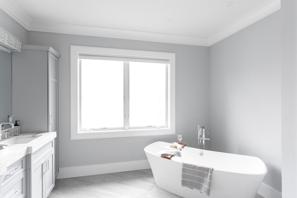 35 Wayne Road Newton, MA 02459 - Photo 22 of 33 a bathroom with a bathtub and sink