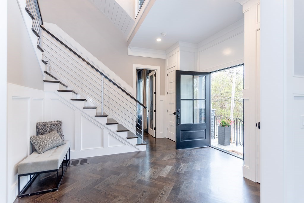 35 Wayne Road Newton, MA 02459 - Photo 6 of 33 a view of entryway and hall with wooden floor