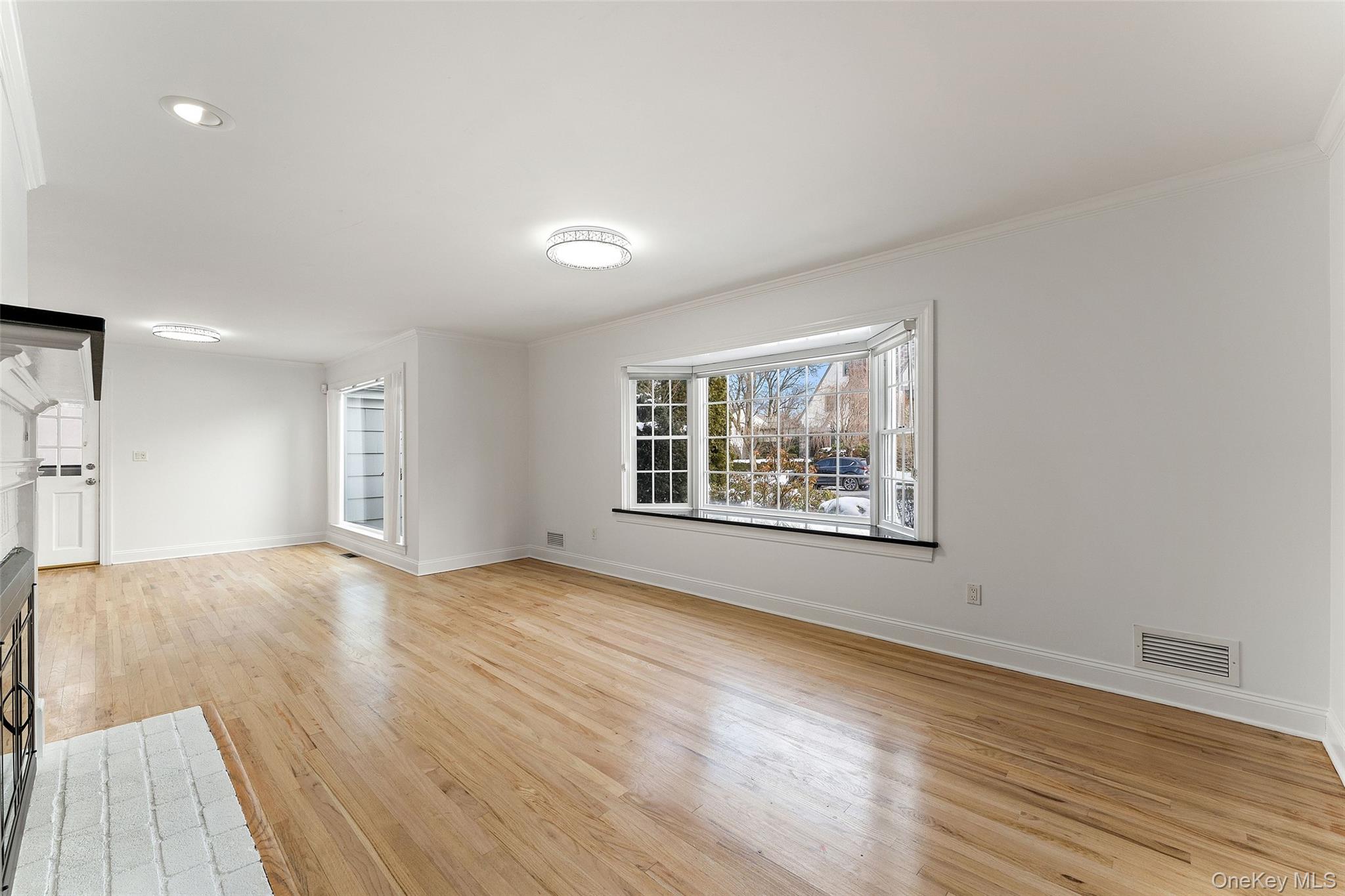 14 Wakefield Road Scarsdale, NY 10583 - Photo 6 of 27 Den with wood burning fireplace.