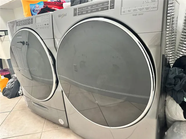 a utility room with a washer and dryer