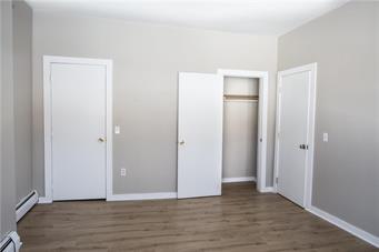 344 Bushkill Street, Unit 2 Easton, PA 18042 - Photo 8 of 30 Clean lines and abundant natural light create a welcoming and comfortable atmosphere in this well-appointed space.