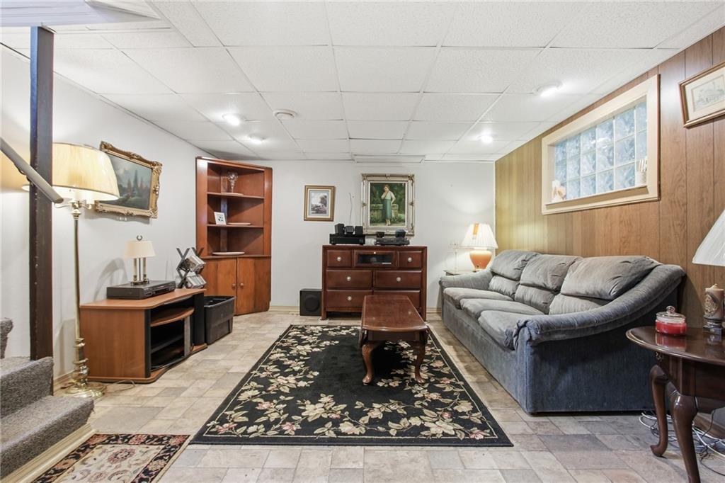 116 Hidden Valley Road Canonsburg, PA 15317 - Photo 23 of 33 An expansive finished lower level perfect for movie nights, game days, or family gatherings.
