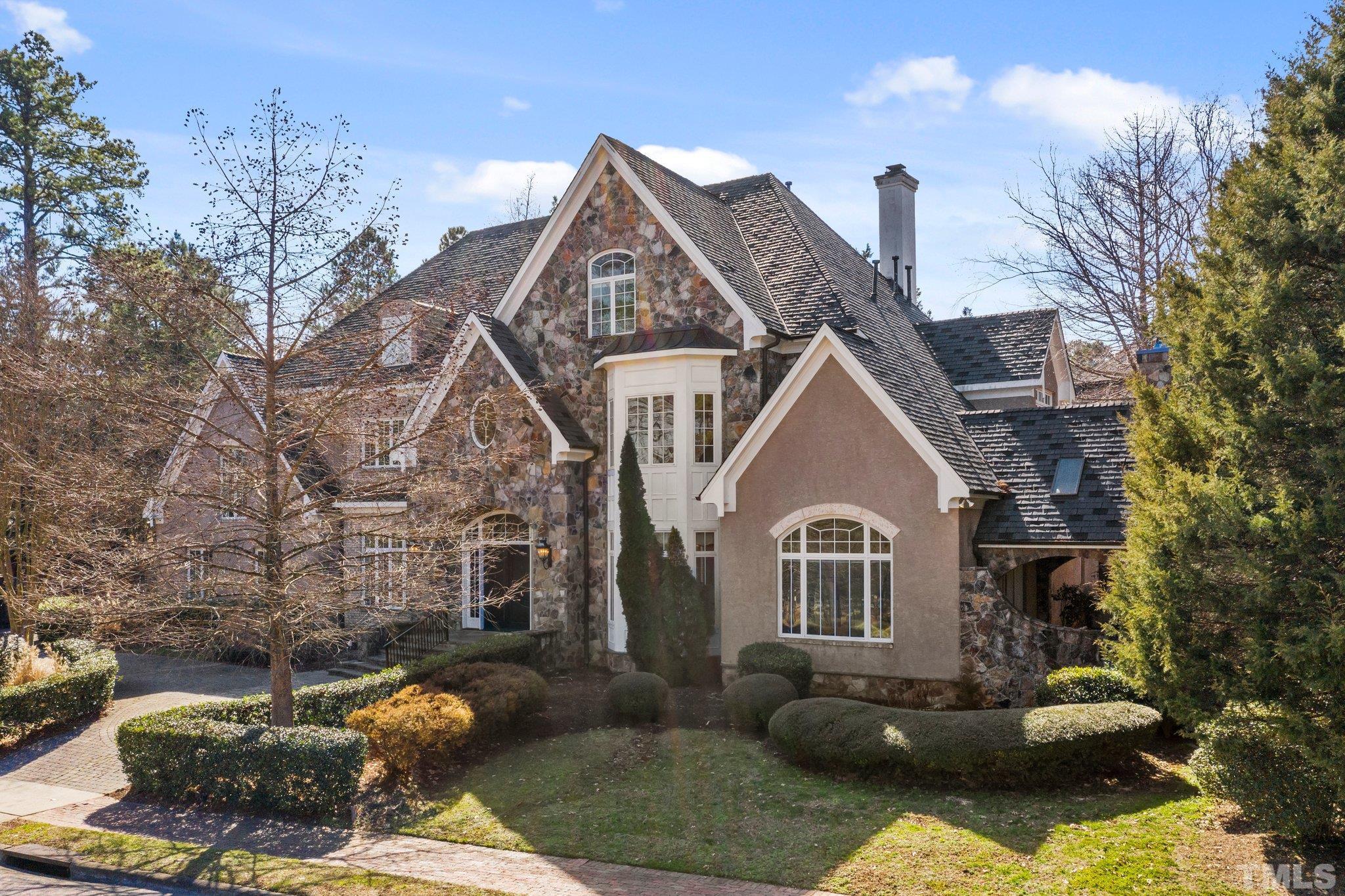12501 Village Springs Road Raleigh, NC 27614 - Photo 11 of 93 a front view of a house with a yard