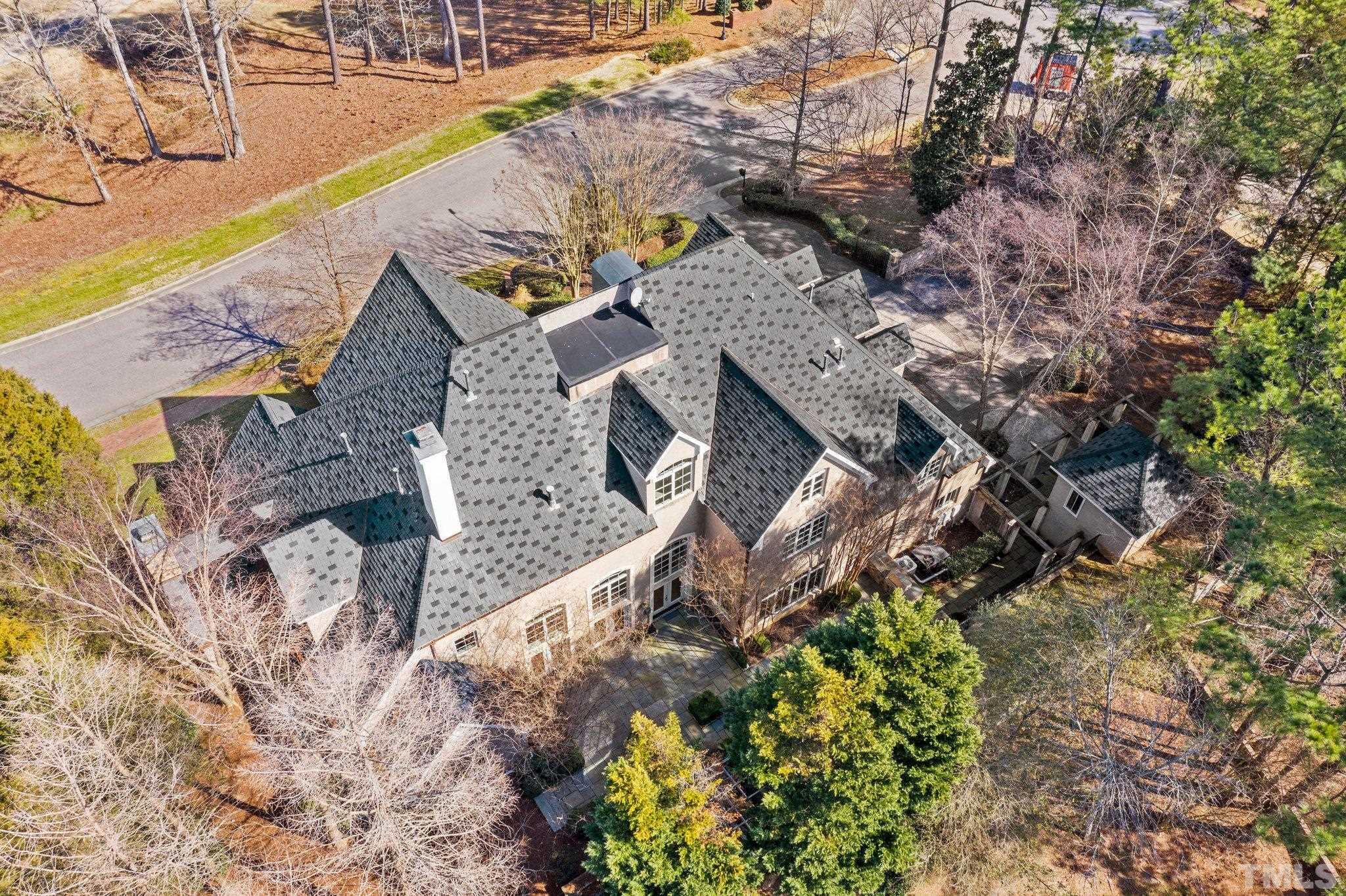 12501 Village Springs Road Raleigh, NC 27614 - Photo 20 of 93 a view of a house with a yard