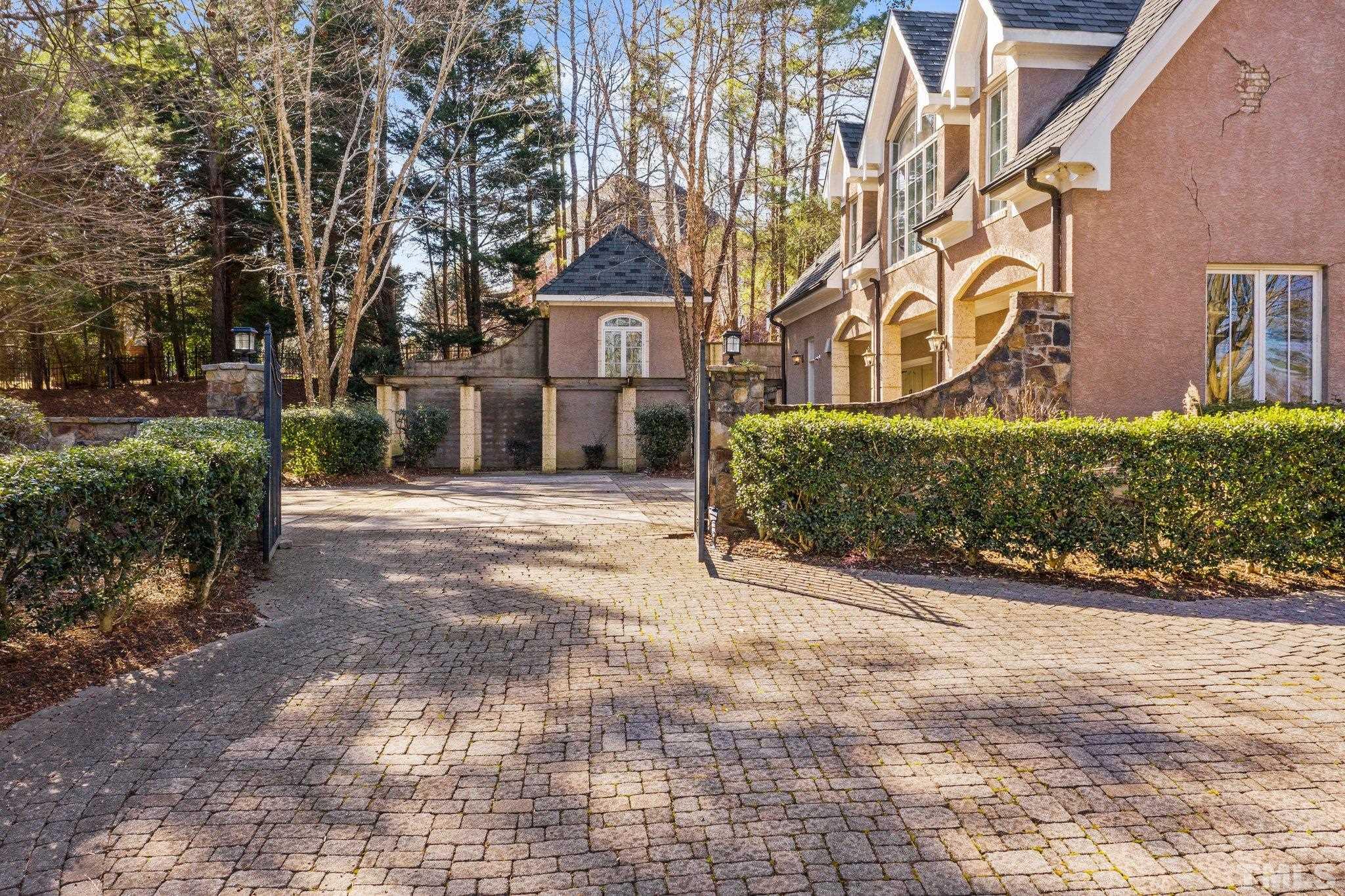 12501 Village Springs Road Raleigh, NC 27614 - Photo 23 of 93 a front view of a house with a yard and garage