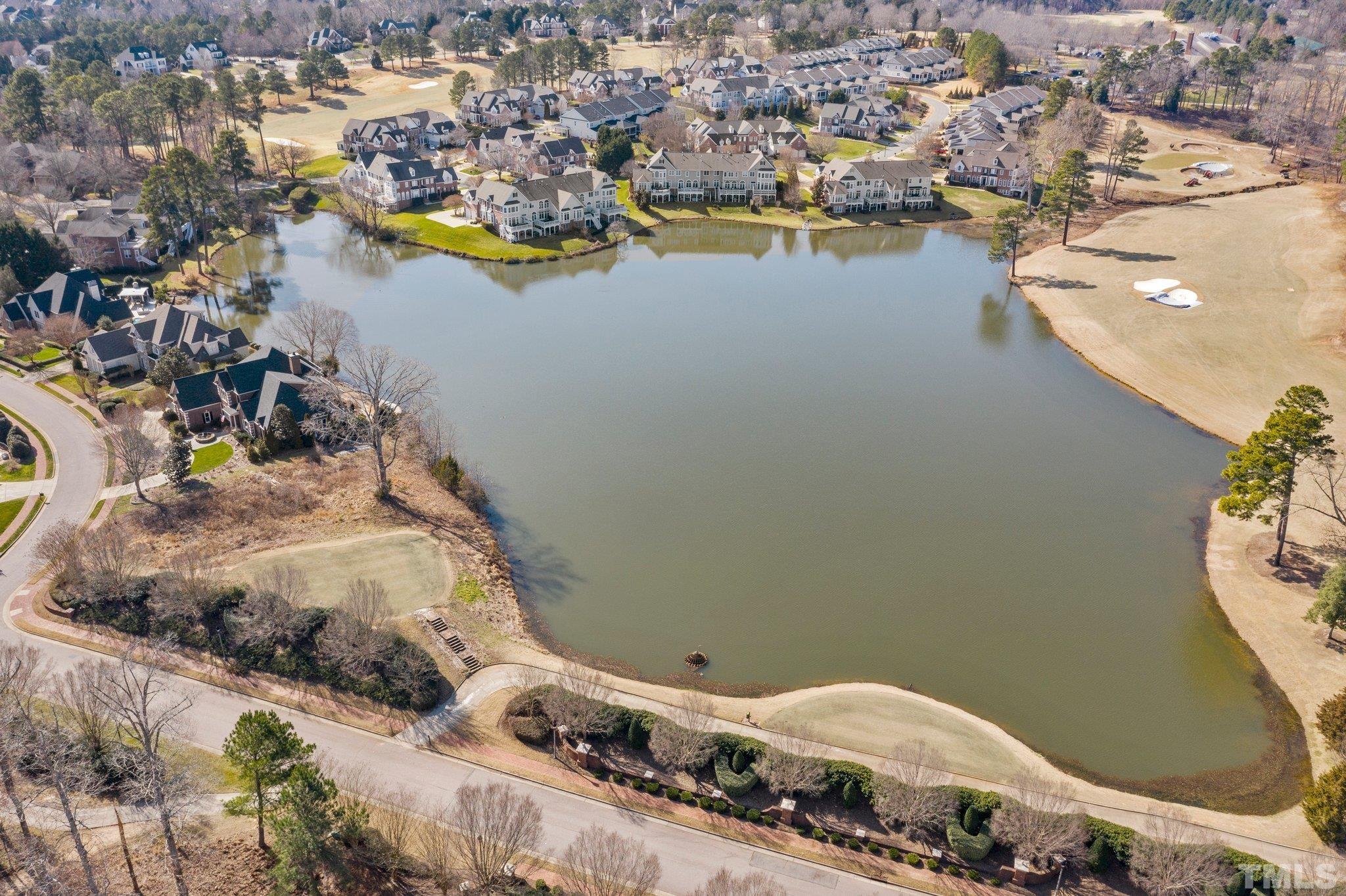 12501 Village Springs Road Raleigh, NC 27614 - Photo 42 of 93 an aerial view of a house with a lake view