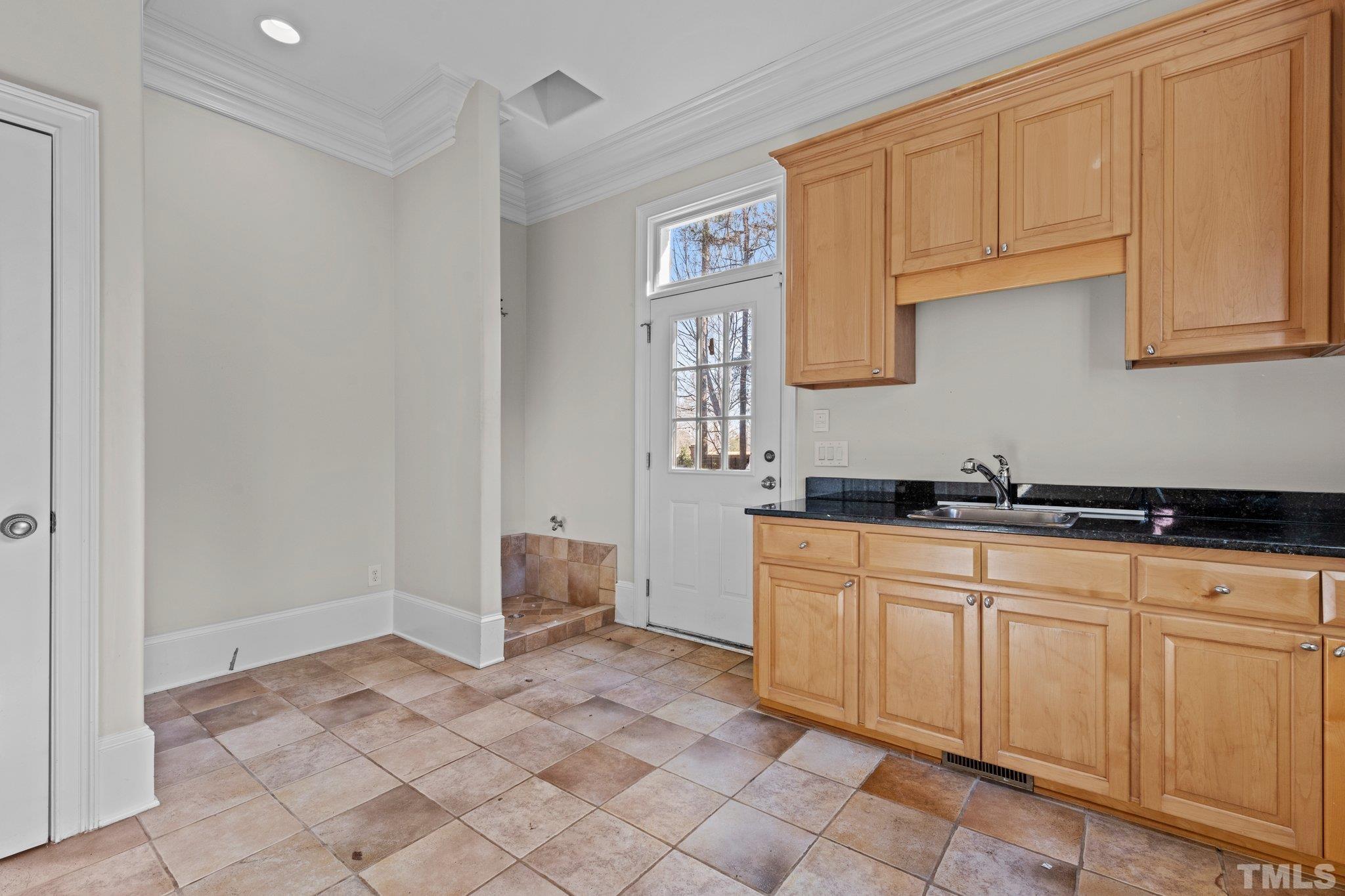 12501 Village Springs Road Raleigh, NC 27614 - Photo 47 of 93 a spacious bathroom with a sink and a mirror