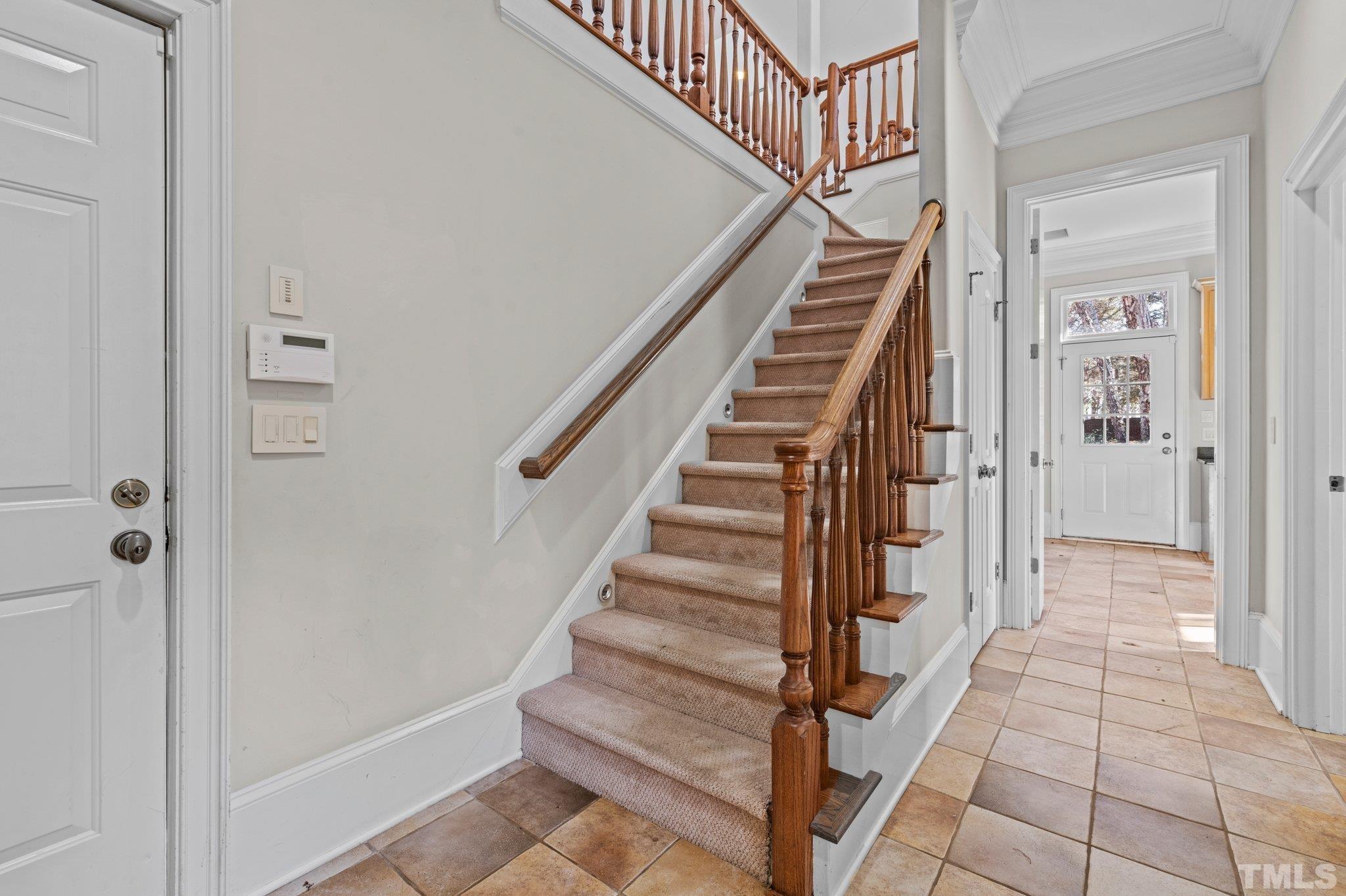 12501 Village Springs Road Raleigh, NC 27614 - Photo 48 of 93 a view of a hallway with wooden floor and entryway