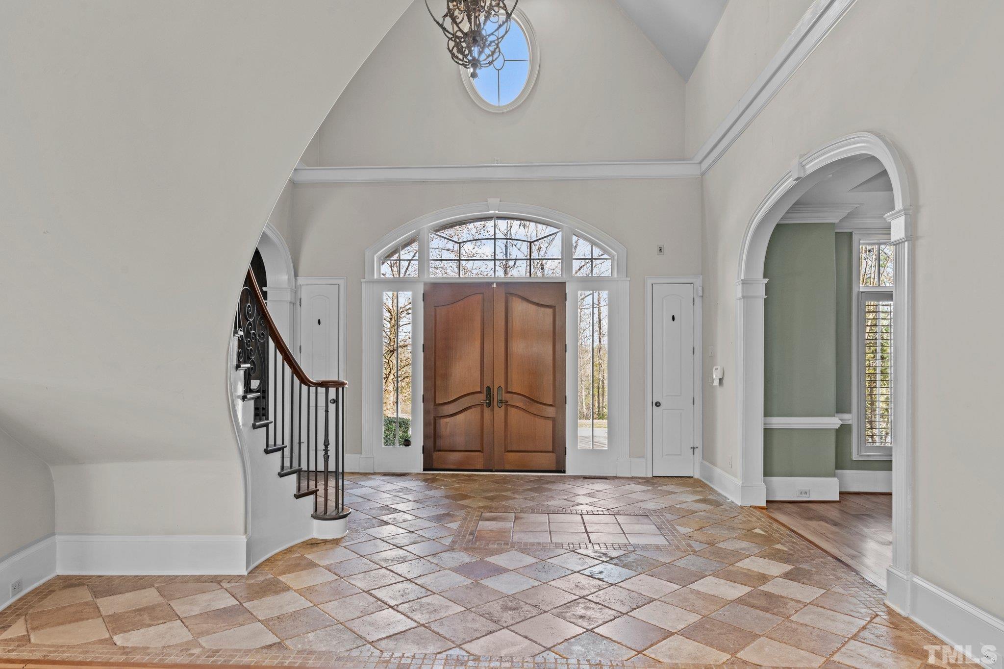 12501 Village Springs Road Raleigh, NC 27614 - Photo 57 of 93 a view of an entryway with a staircase