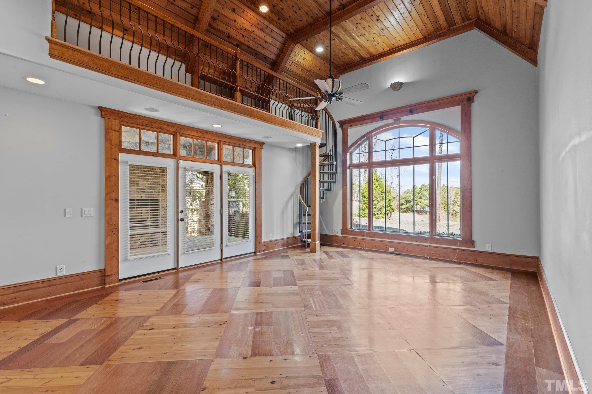 12501 Village Springs Road Raleigh, NC 27614 - Photo 62 of 93 a view of an empty room with a balcony