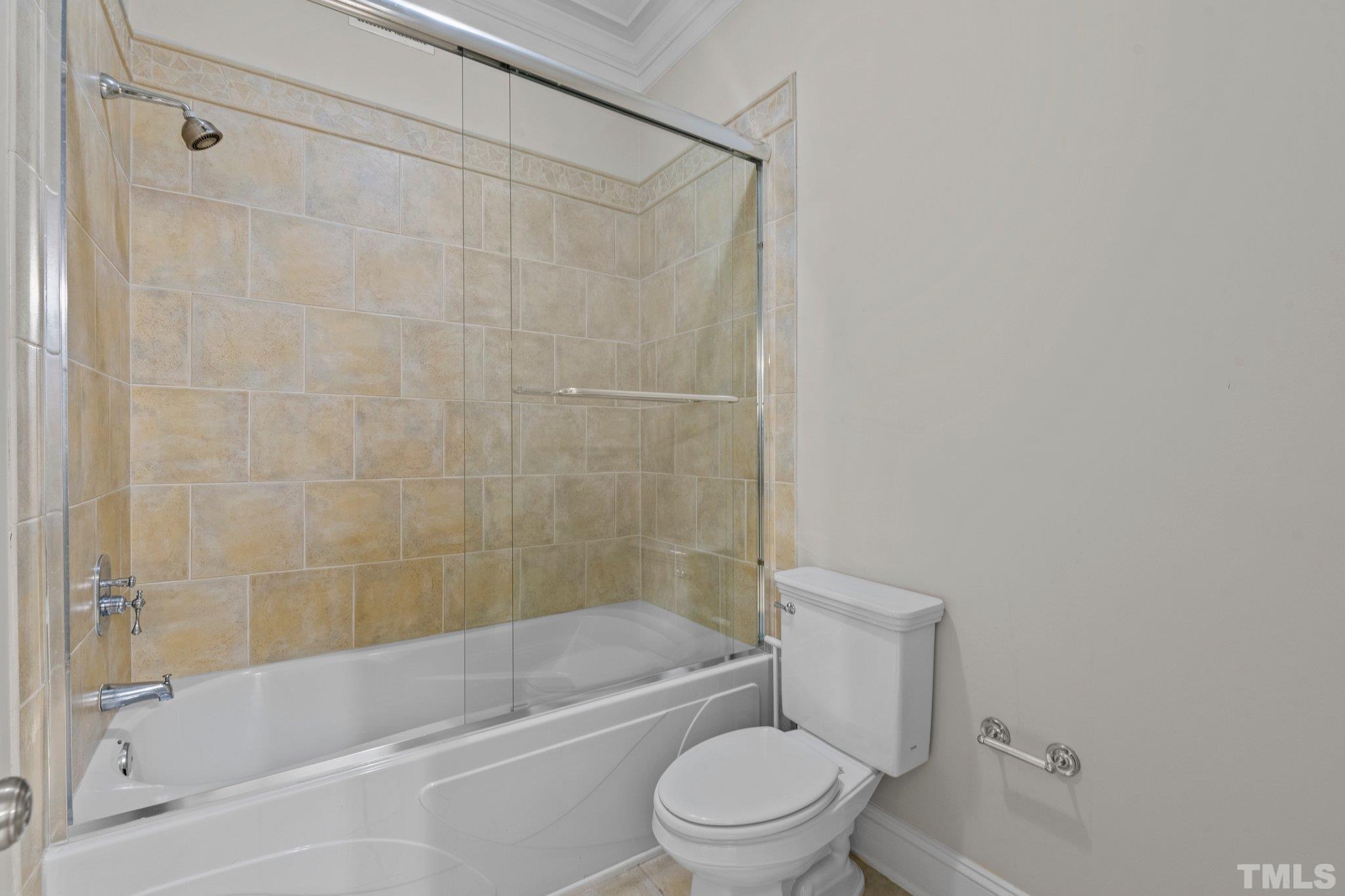 12501 Village Springs Road Raleigh, NC 27614 - Photo 75 of 93 a bathroom with a toilet and a bath tub