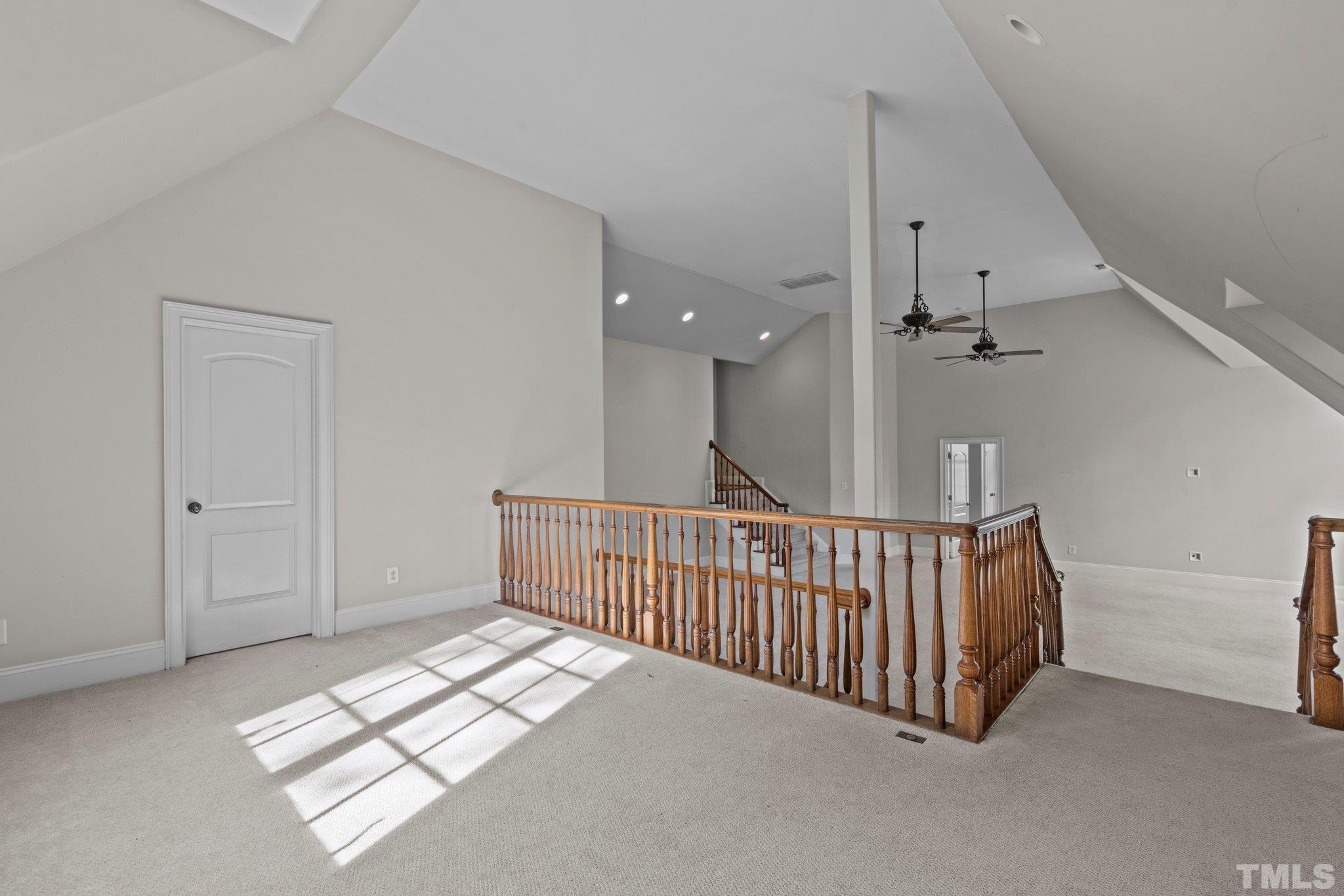 12501 Village Springs Road Raleigh, NC 27614 - Photo 79 of 93 a view of a hallway with windows