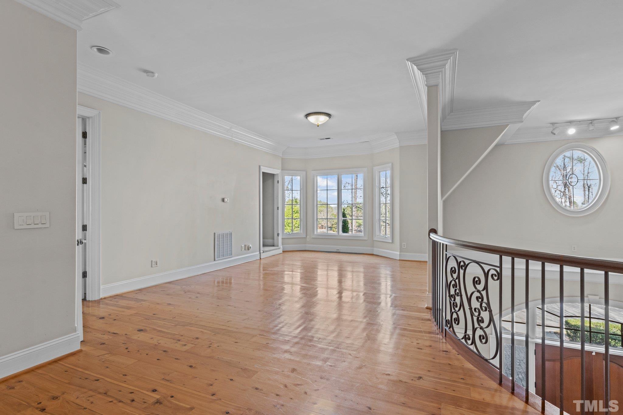 12501 Village Springs Road Raleigh, NC 27614 - Photo 80 of 93 a view of an entryway with wooden floor