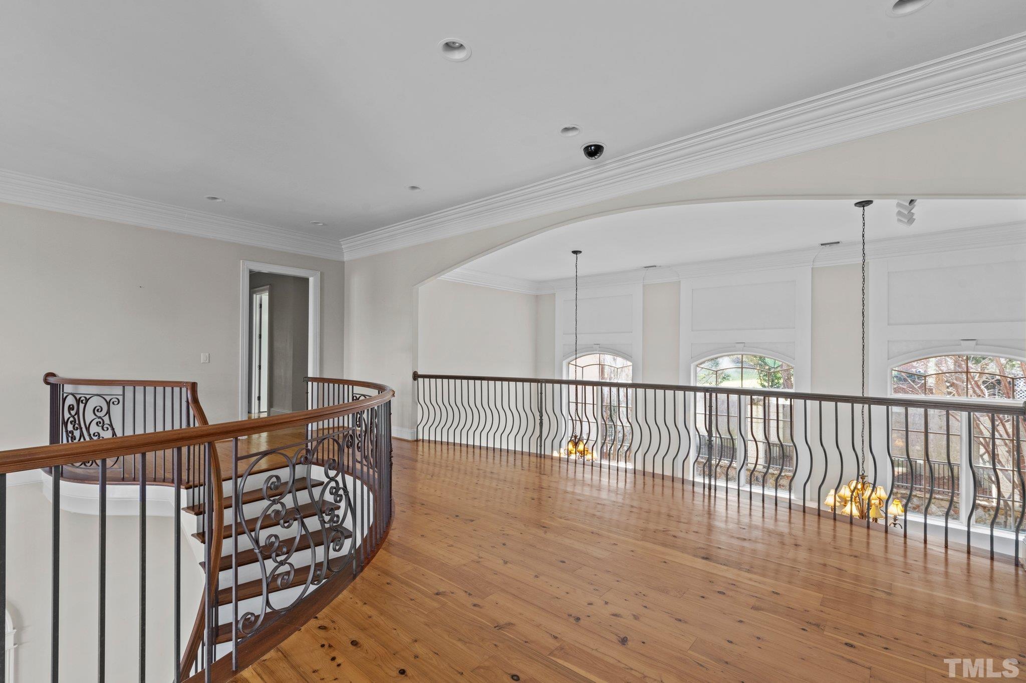 12501 Village Springs Road Raleigh, NC 27614 - Photo 84 of 93 a view of a hallway with wooden floor