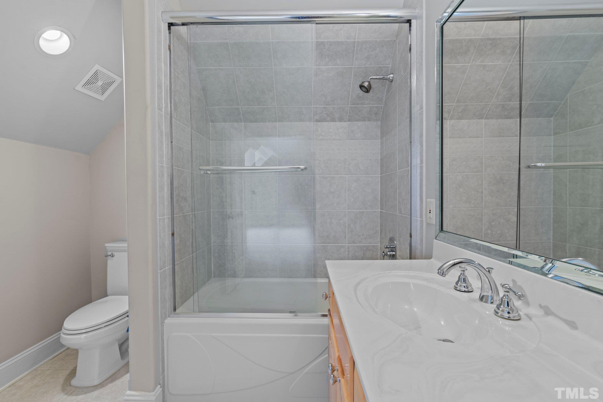 12501 Village Springs Road Raleigh, NC 27614 - Photo 89 of 93 a bathroom with a sink toilet and shower