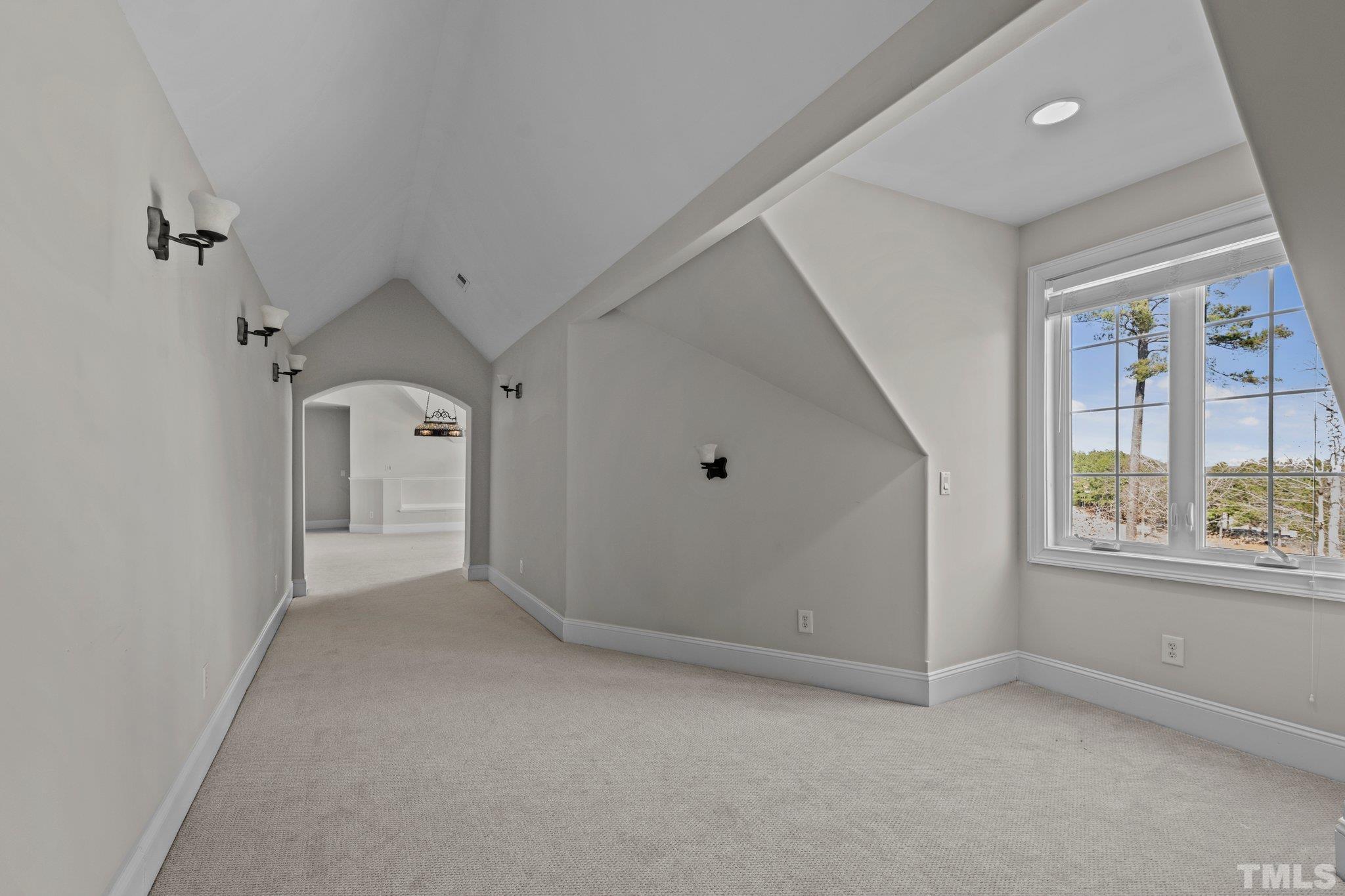 12501 Village Springs Road Raleigh, NC 27614 - Photo 90 of 93 an empty room with windows and closet