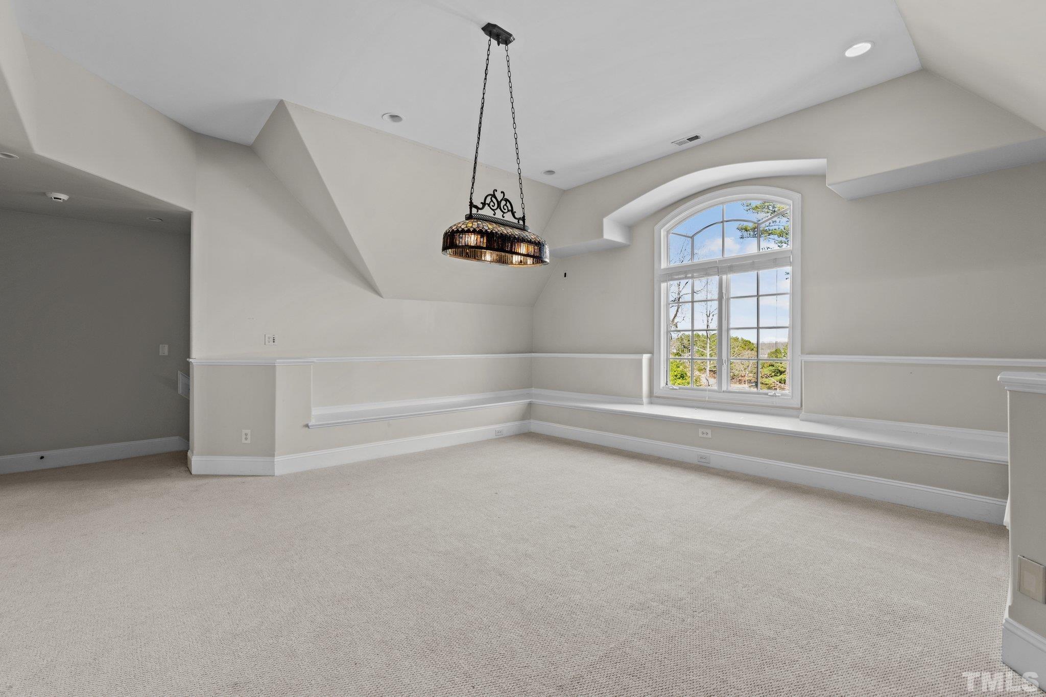12501 Village Springs Road Raleigh, NC 27614 - Photo 91 of 93 en empty room with windows and ceiling fan
