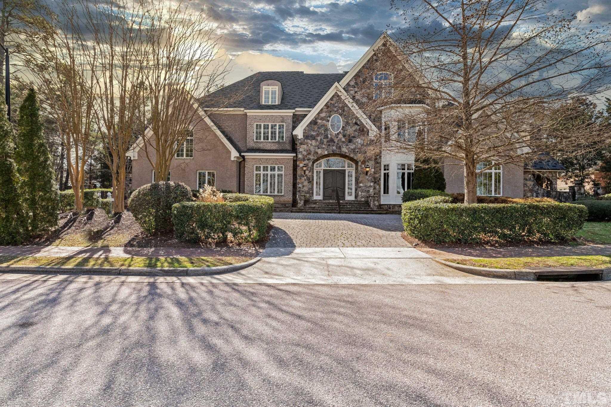 12501 Village Springs Road Raleigh, NC 27614 - Photo 10 of 93 a front view of a house with a yard