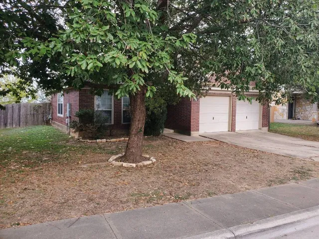 a house with trees in front of it