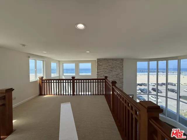 a view of a hallway with workspace