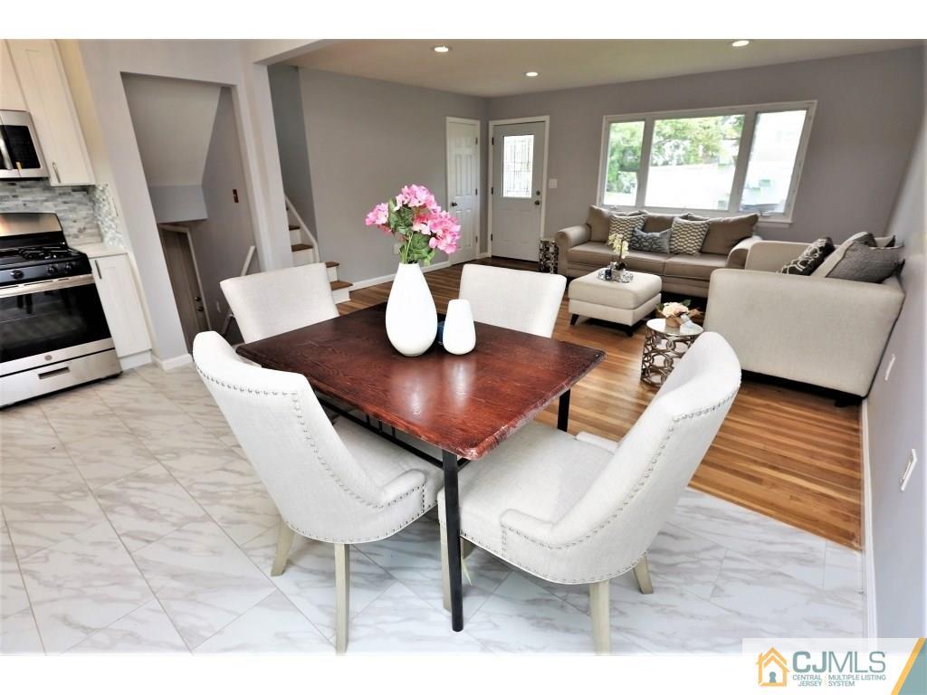 173 McFarlane Road Colonia, NJ 07067 - Photo 19 of 25 a living room with furniture and wooden floor