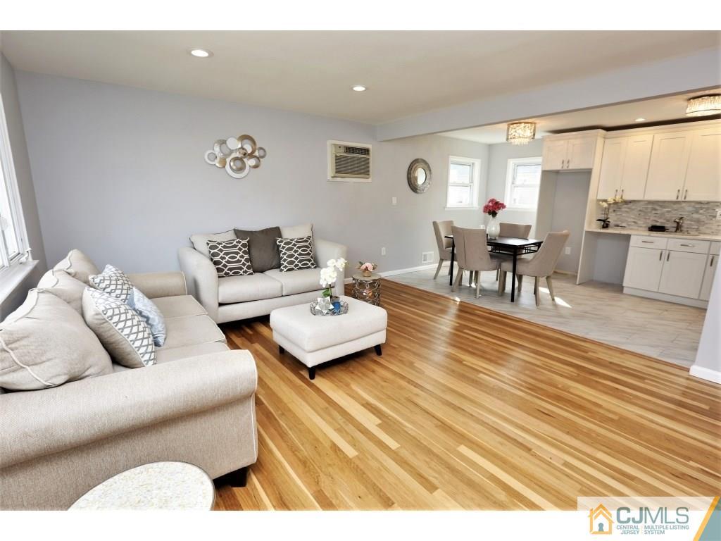 173 McFarlane Road Colonia, NJ 07067 - Photo 9 of 25 a living room with furniture and wooden floor