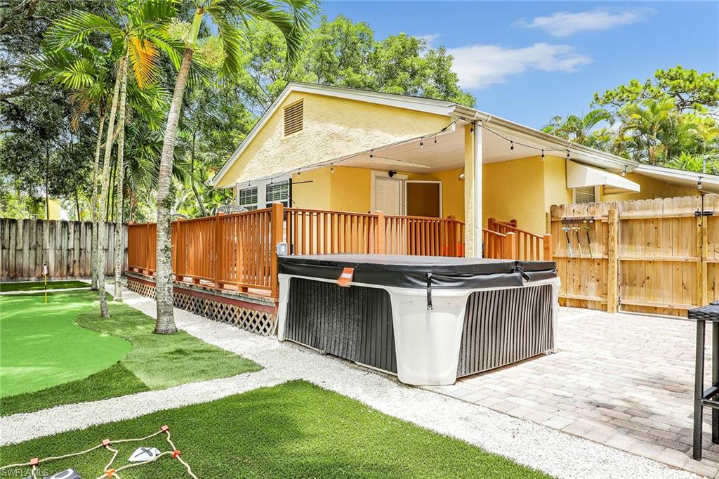 2780 Weeks Avenue Naples, FL 34112 - Photo 21 of 34 a view of a house with a yard