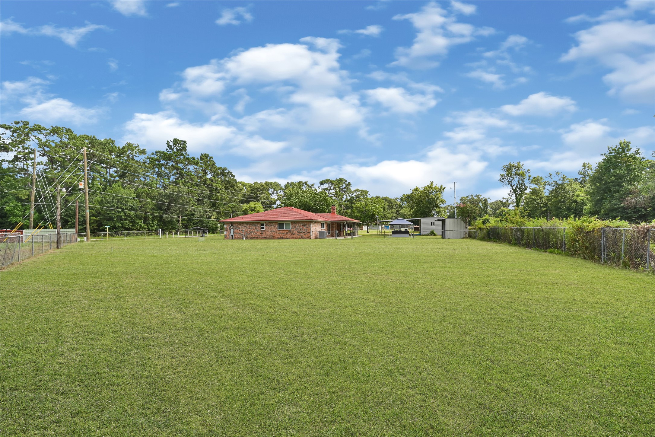 20135 Timber Line Lane New Caney, TX 77357 - Photo 27 of 30 a view of a field with clear sky
