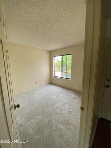 a view of a lake with a big yard