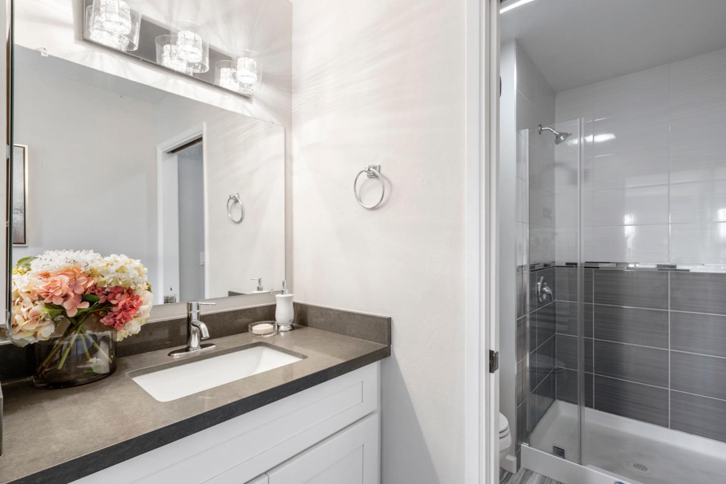 20173 Northcrest Square Cupertino, CA 95014 - Photo 21 of 29 a bathroom with a sink double vanity and a mirror