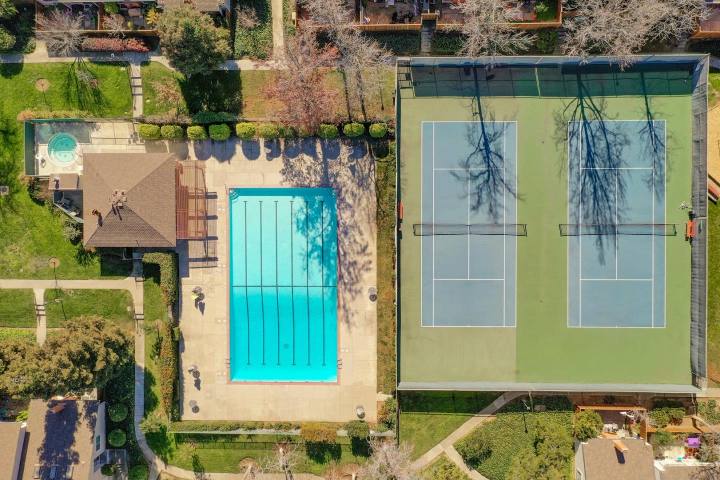 20173 Northcrest Square Cupertino, CA 95014 - Photo 26 of 29 a view of a house with a swimming pool