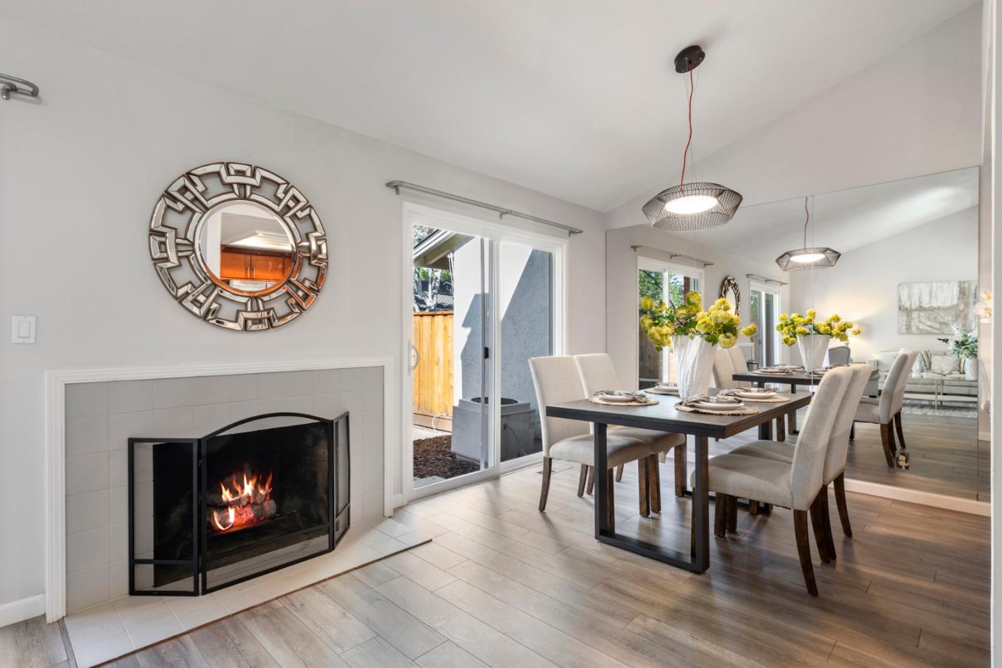 20173 Northcrest Square Cupertino, CA 95014 - Photo 7 of 29 a view of a livingroom with furniture and a fireplace