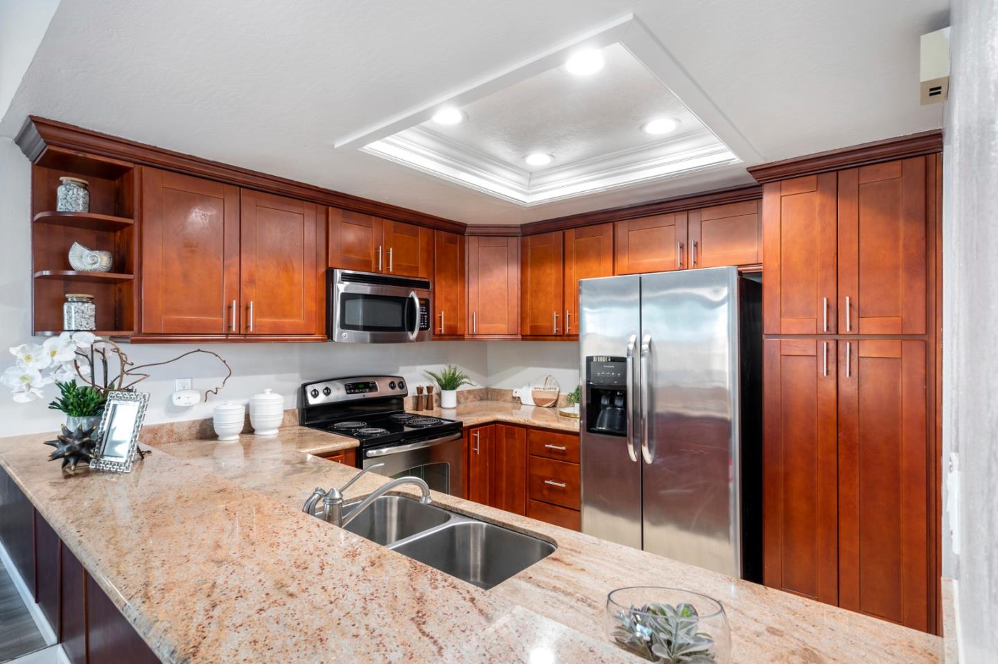 20173 Northcrest Square Cupertino, CA 95014 - Photo 10 of 29 a kitchen with a refrigerator sink and microwave